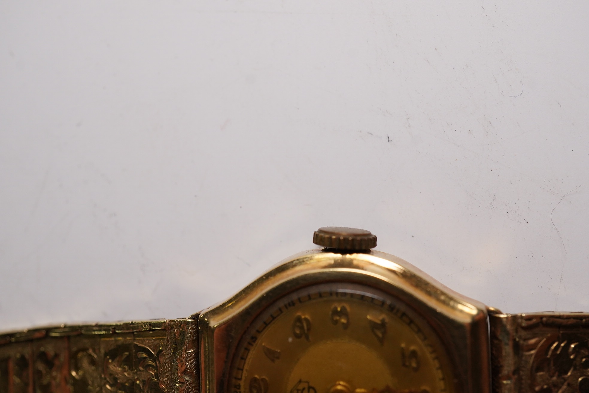 A lady's 14k manual wind wrist watch, on a 14k bracelet, gross weight 14 grams. Condition - poor to fair